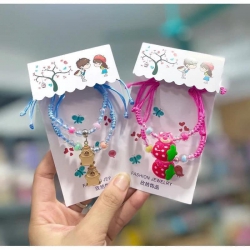 Set vòng tay đôi dây rút gắn charm hoạt hình siêu cute cập bến nha mí bà tại Quảng Nam